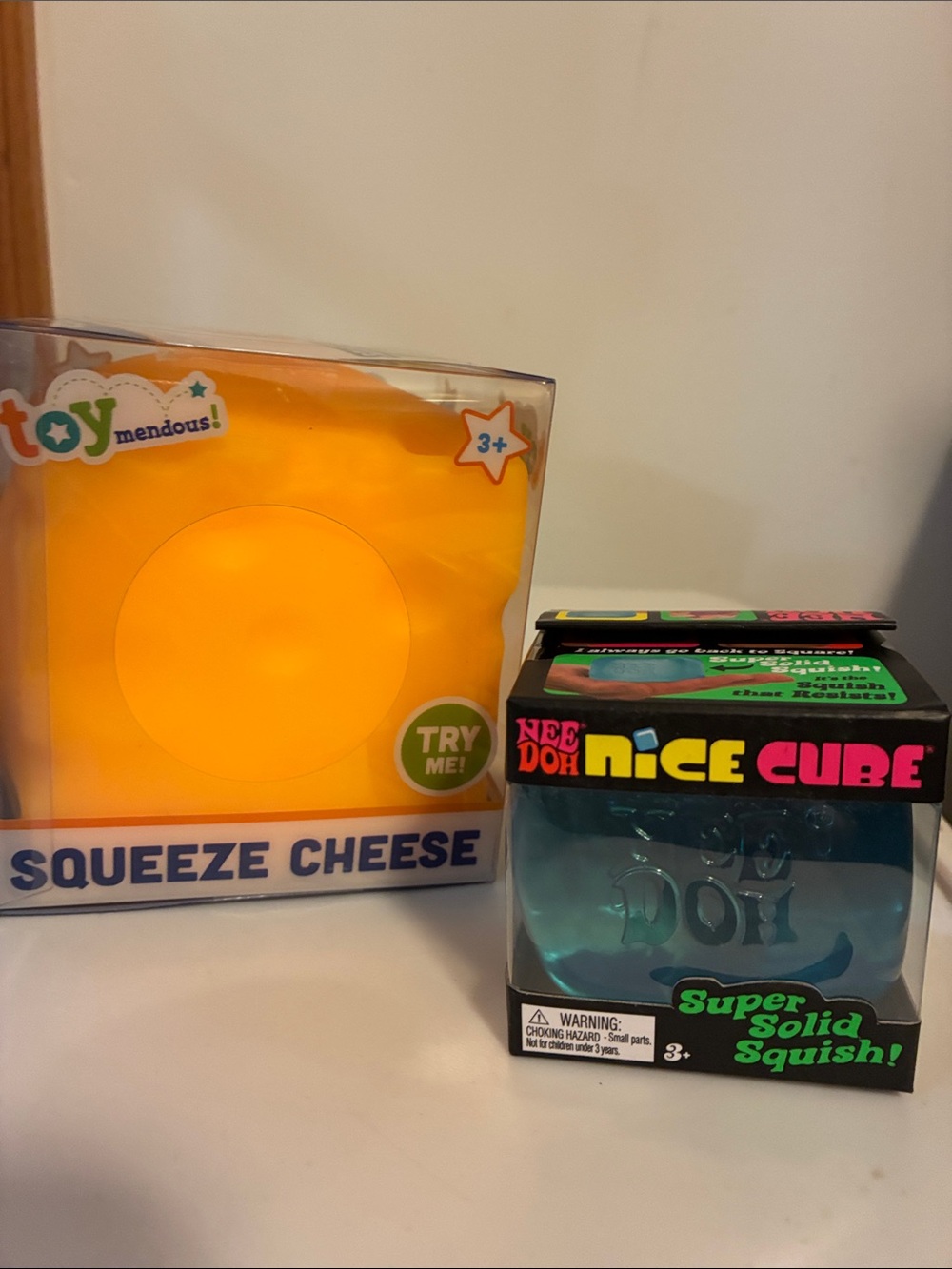 Toy Mendous Squeeze Cheese & NeeDoh Nice Cube Sensory Toy Bundle - Yellow & Blue